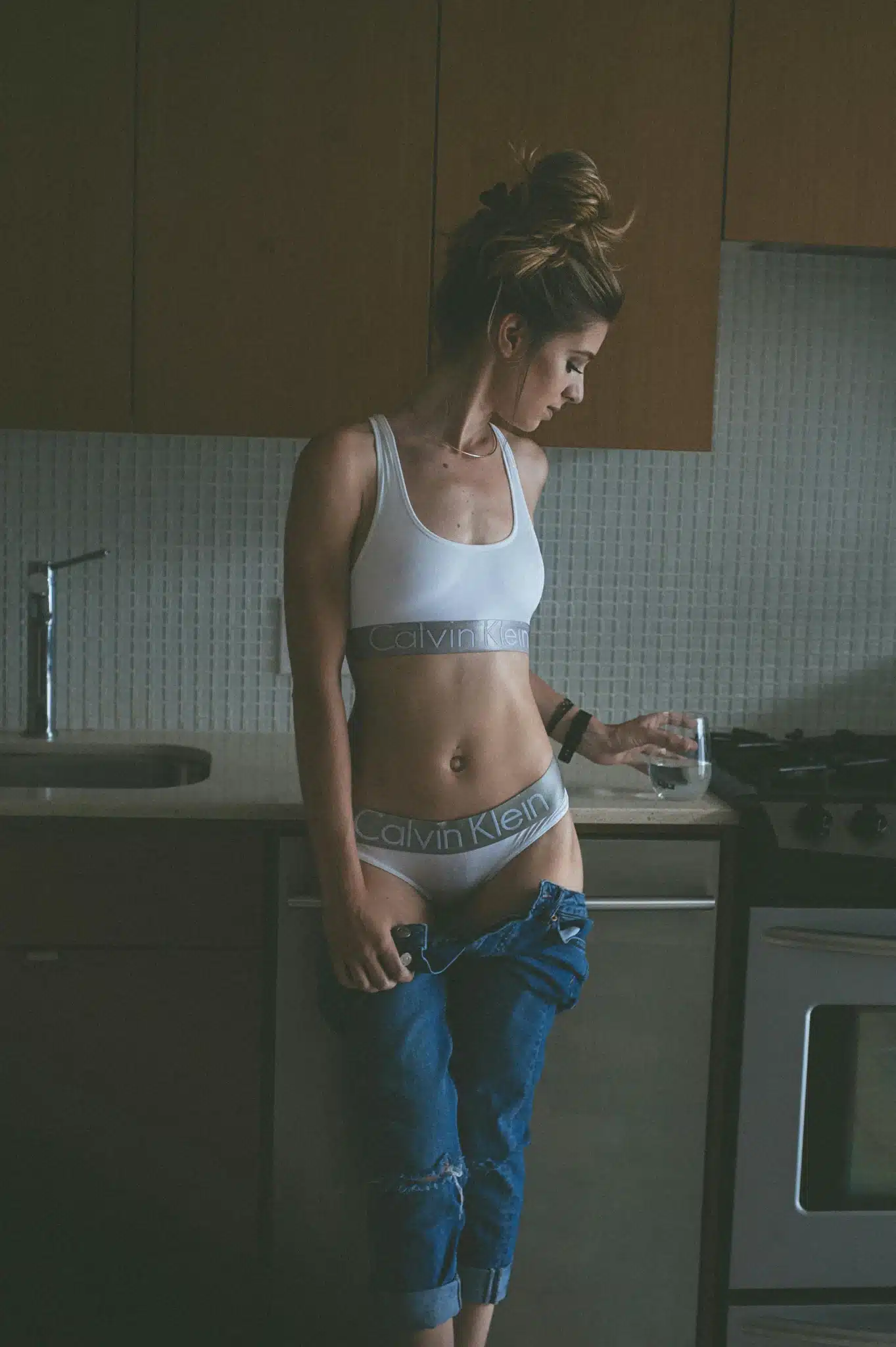Woman in casual kitchen attire
