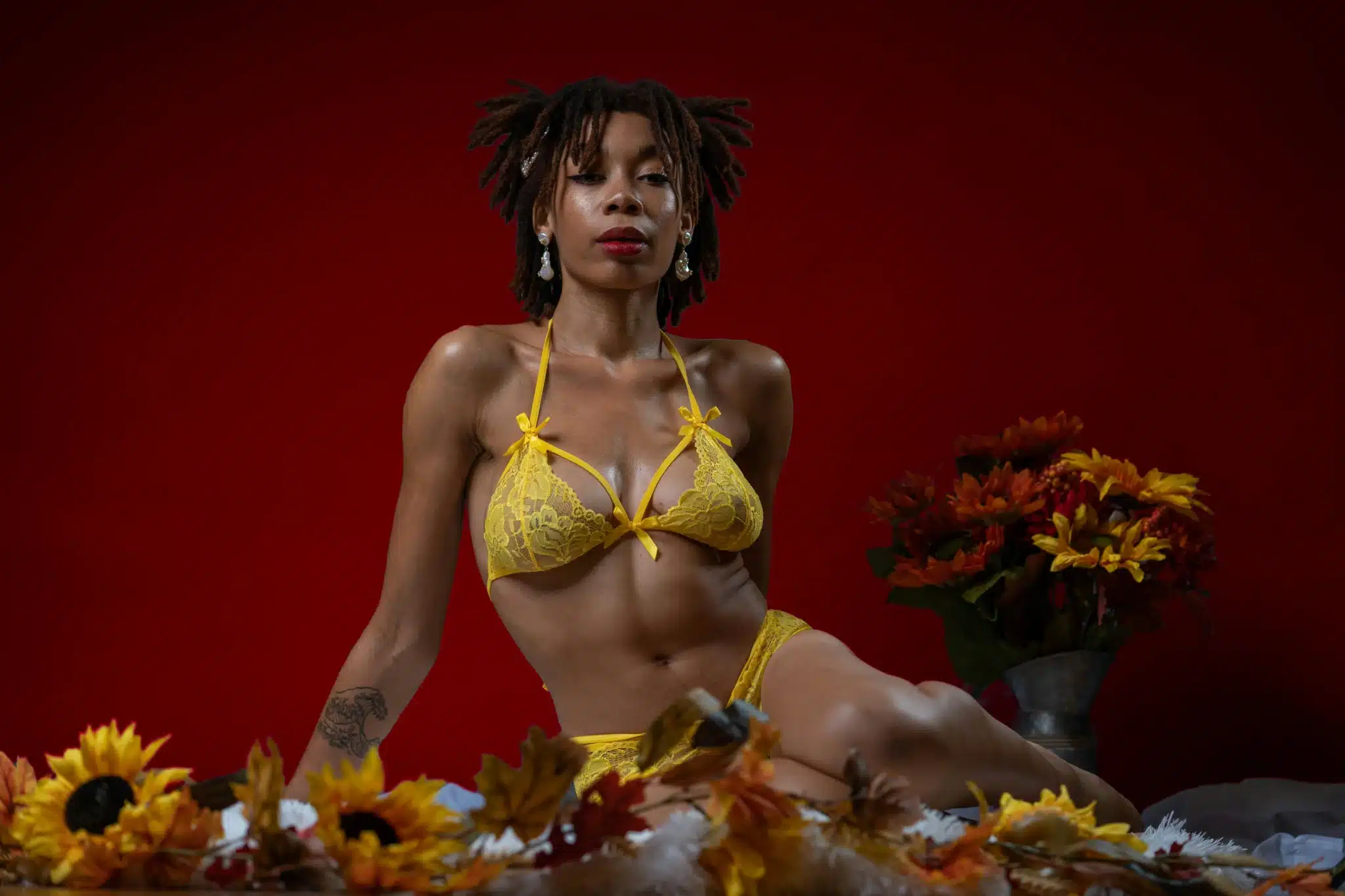 Model in yellow lingerie with flowers Model in yellow lingerie with flowers